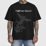 Bee Swarm front model mockup: original artwork composited onto an AI-generated tattooed model wearing blue jeans. Neutral light gray background.