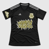 Gold Adidas football shirt detail front mockup: original artwork composited onto a realistic slim-fit jersey flatlay. Neutral light gray background.