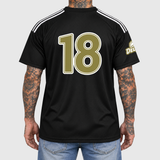 gold Adidas football jersey model back mockup, restrained ink color on neutral light gray.