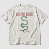 Tower of Snakes Nirvana shirt product front, AI-generated studio styling, neutral light-gray background.