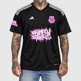 pink Adidas football jersey model front mockup, restrained ink color on neutral light gray.